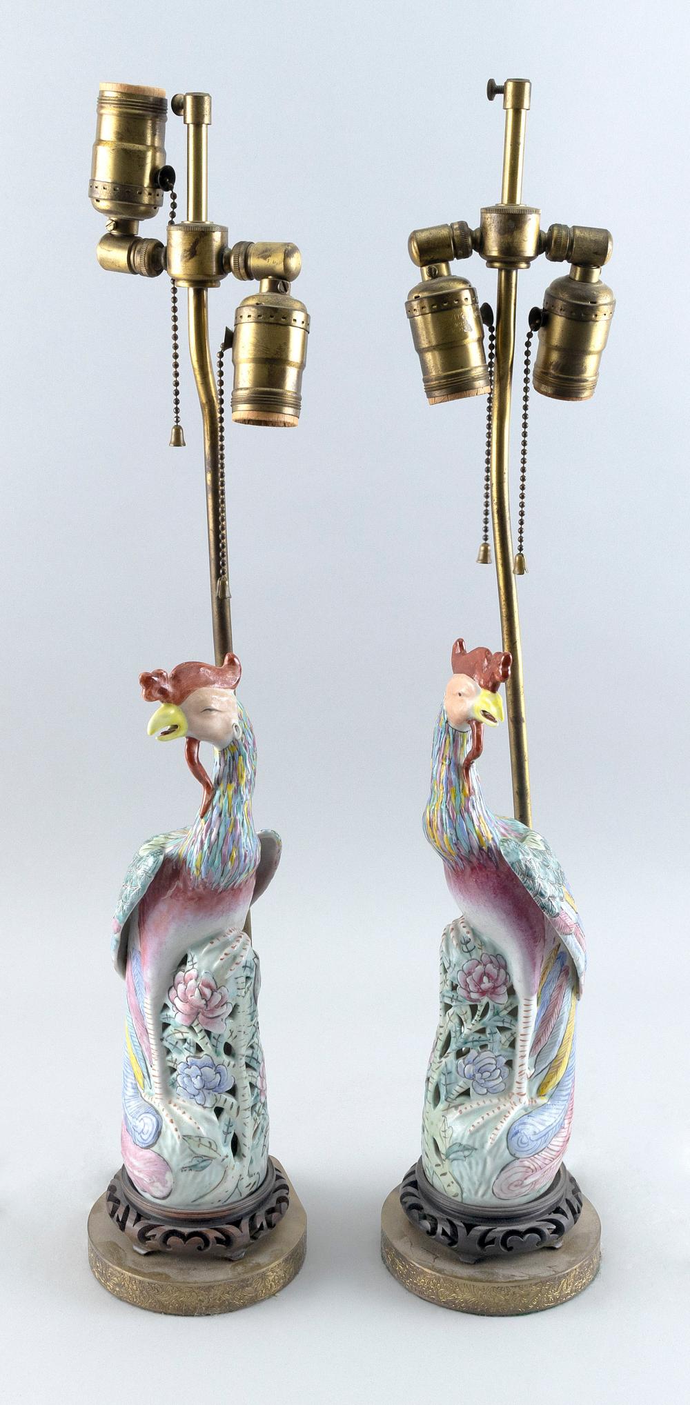 Appraisal: PAIR OF CHINESE EXPORT FAMILLE ROSE PORCELAIN PHOENIX FIGURES MOUNTED