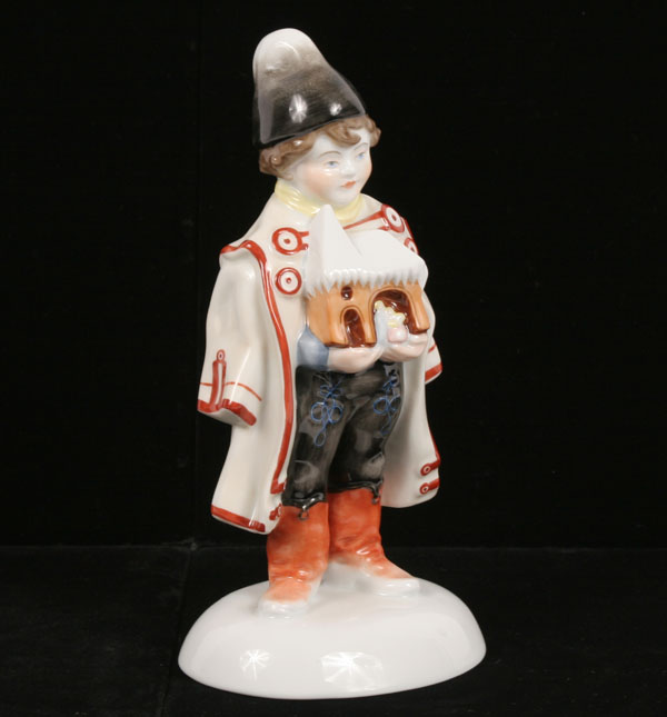 Appraisal: Herend porcelain hand painted figure of a boy holding a