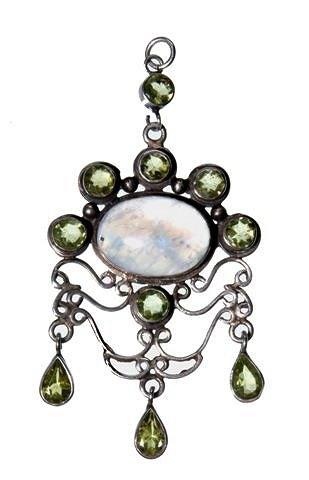 Appraisal: AN ARTS AND CRAFTS STYLE MOONSTONE AND PERIDOT SET PENDANT