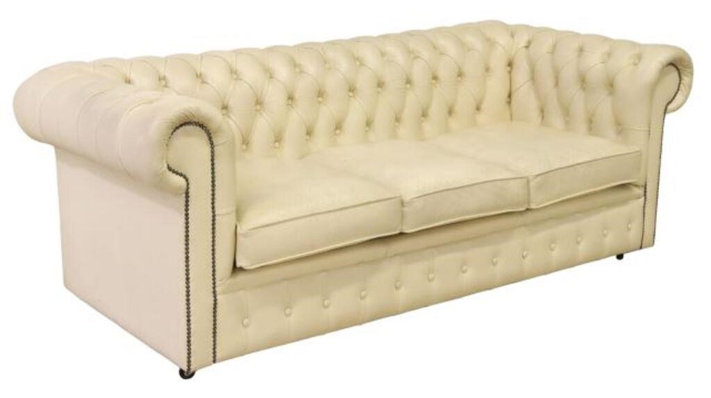 Appraisal: English Chesterfield style sofa th c in cream white button-tufted