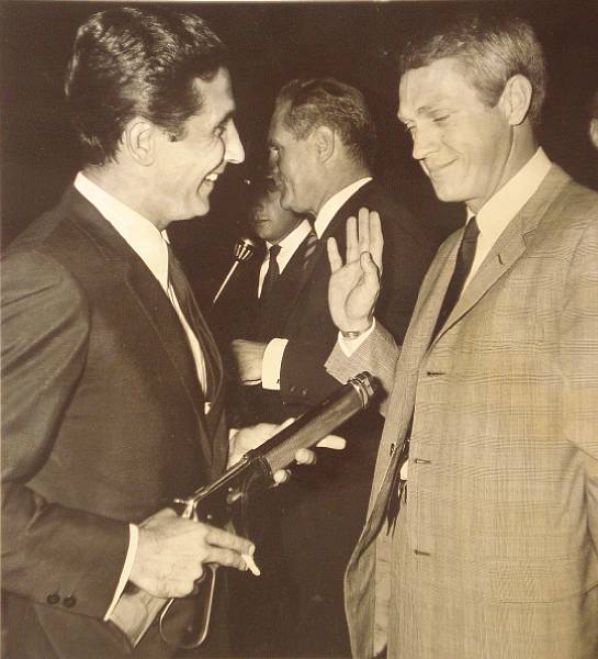 Appraisal: A photograph of Steve McQueen and Gilbert Becaud with 'Mare's