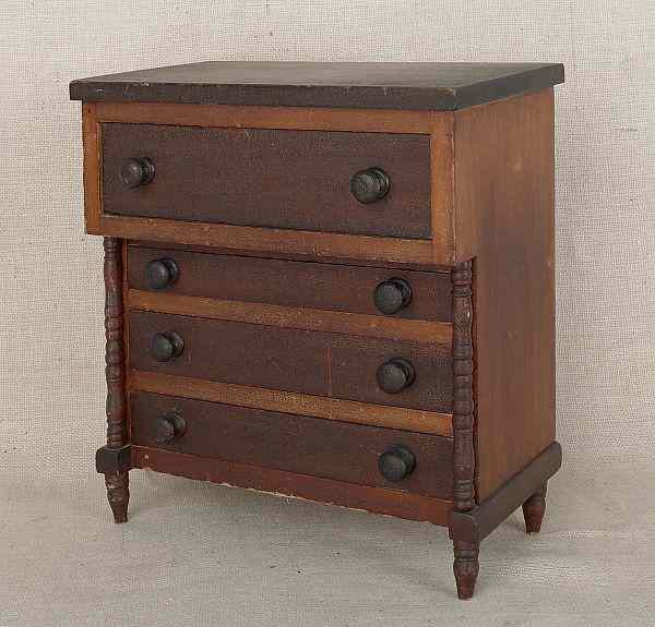 Appraisal: Miniature Pennsylvania stained poplar chest of drawers mid th c