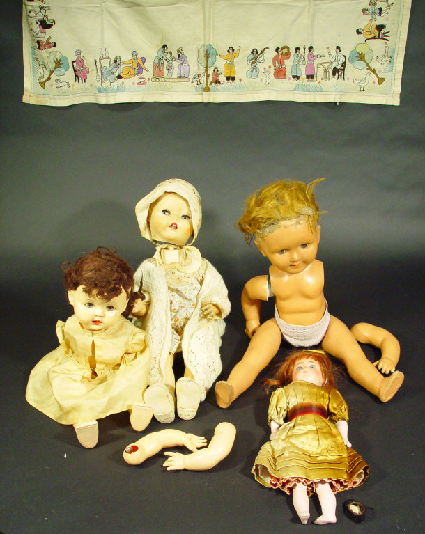 Appraisal: Three composite headed children's dolls with jointed limbs together with