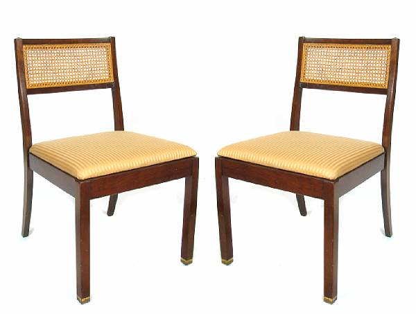 Appraisal: A set of four upholstered and caned back mahogany side