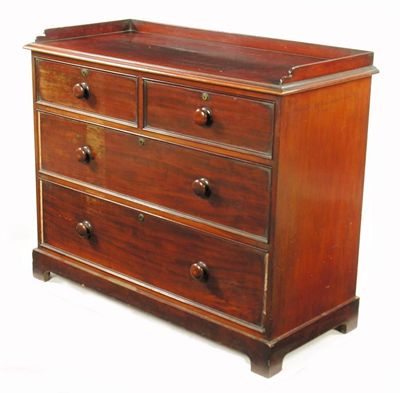 Appraisal: A Victorian mahogany chest the three quarter galleried top above