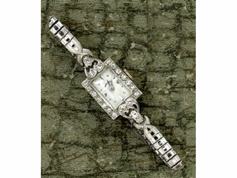 Appraisal: PLATINUM DIAMOND WATCH Lady's Hamilton watch with square dial and