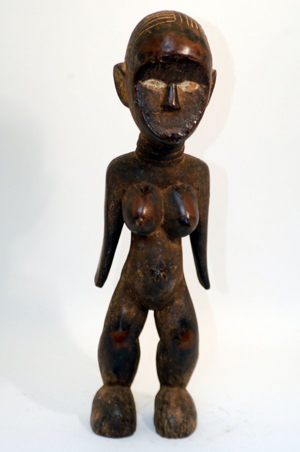 Appraisal: Dan female figure of wood with dark brown patina oval