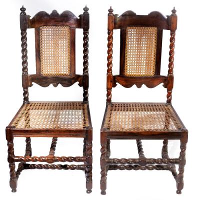 Appraisal: A pair of Dutch colonial stinkwood cane back chairs circa