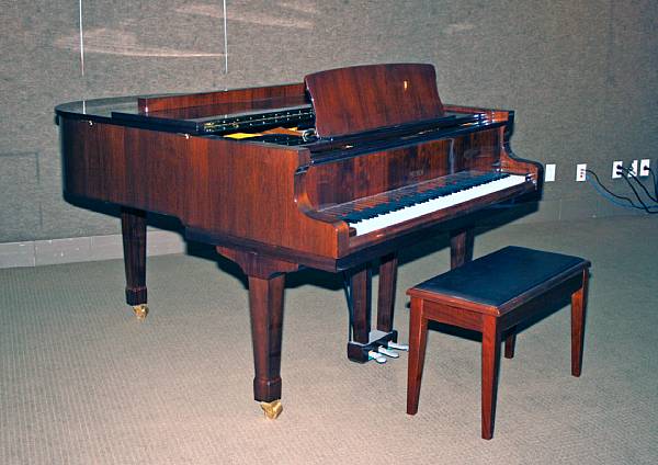 Appraisal: A Petrof mahogany baby grand piano serial number circa length