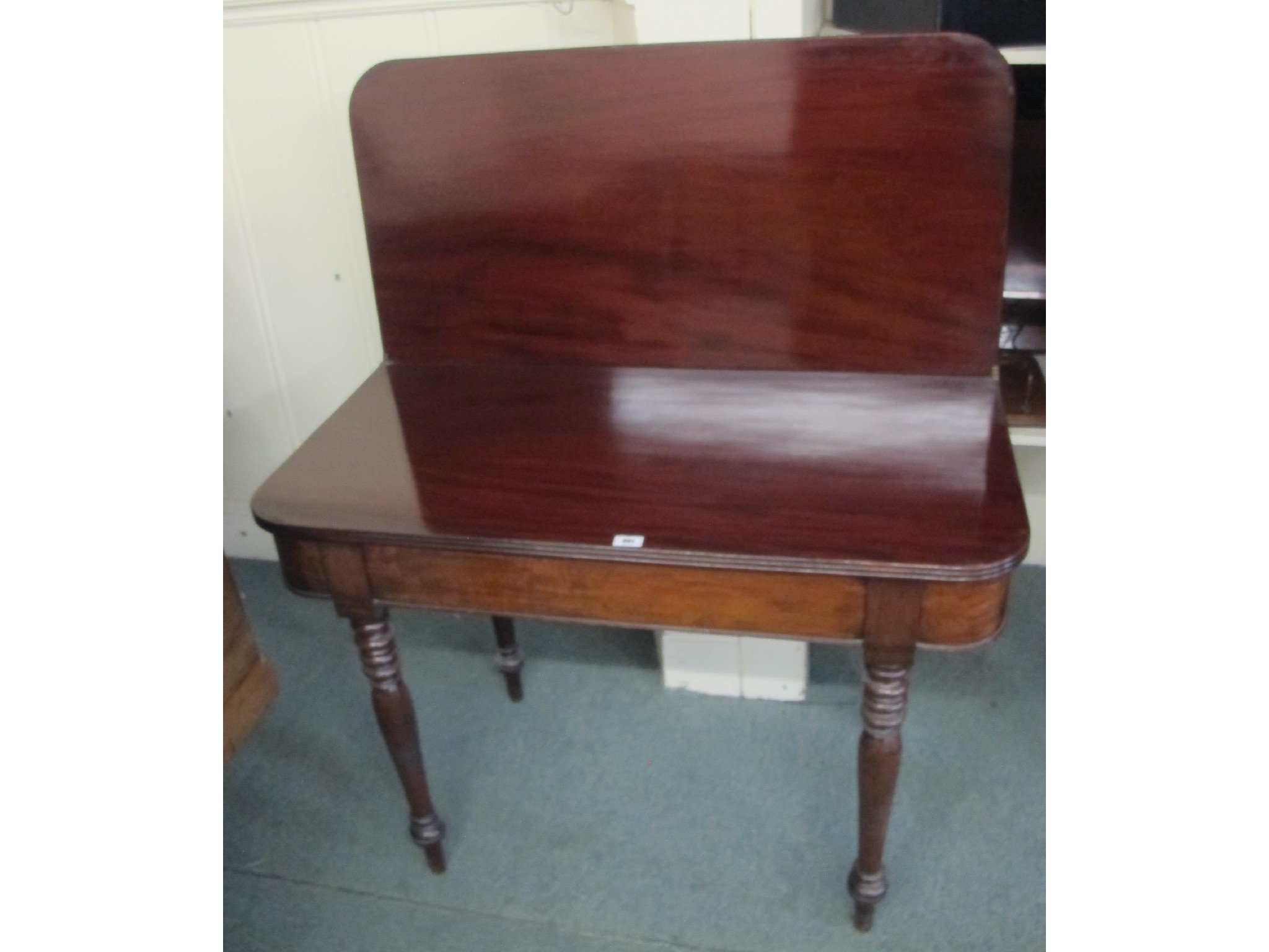 Appraisal: A mahogany D-end fold over table