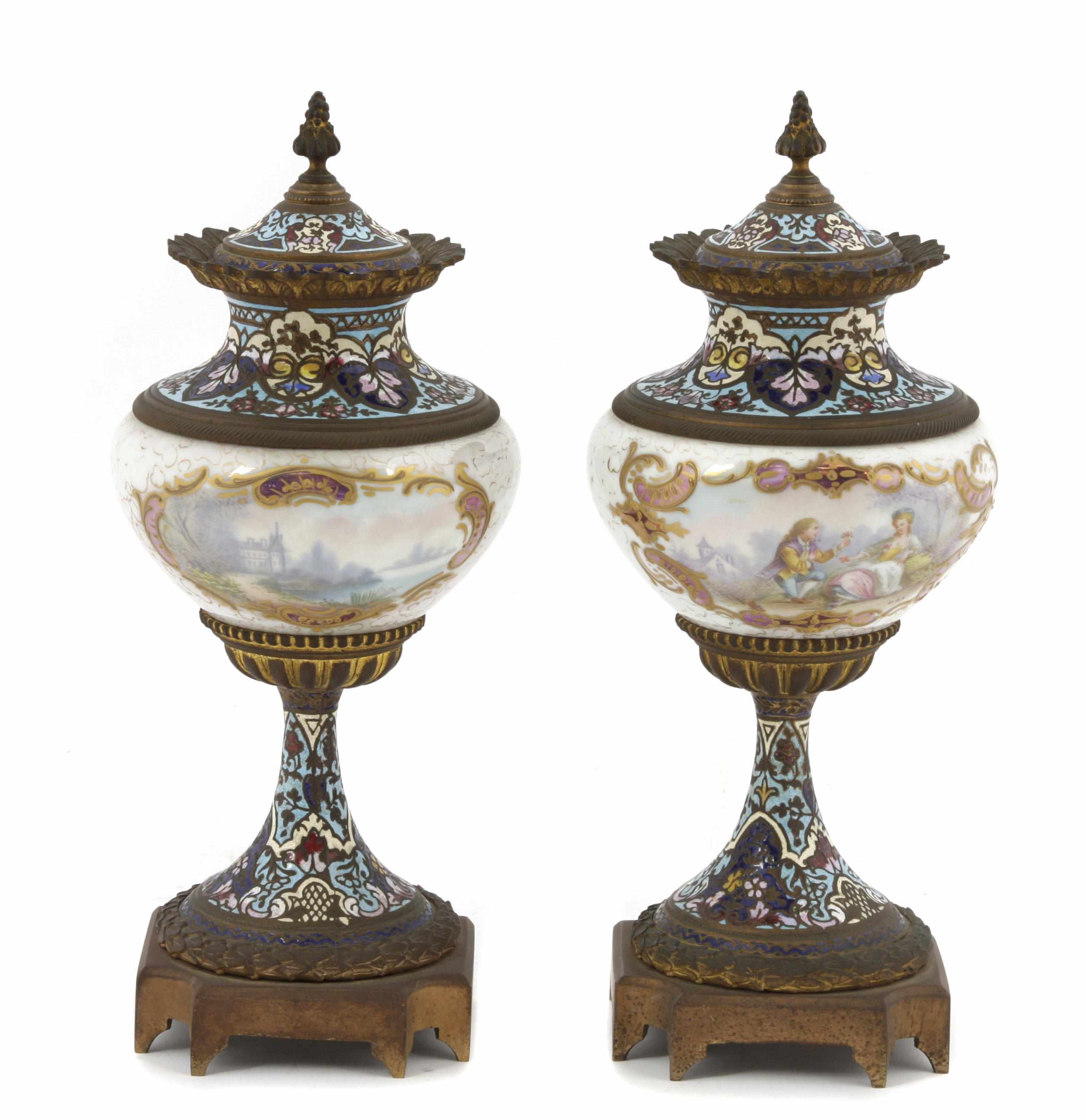 Appraisal: A pair of French porcelain gilt bronze and champlev covered