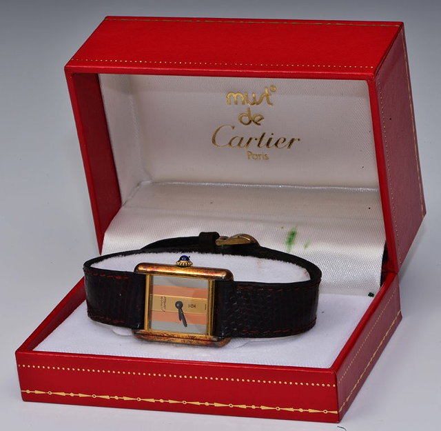 Appraisal: A LADIES CARTIER TANK WRIST WATCH with silver gilt case