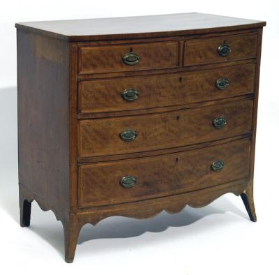 Appraisal: A GEORGE III MAHOGANY CHEST of bow fronted form crossbanded