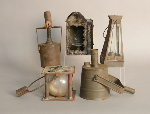 Appraisal: Two tin parade torches th c together with two carry