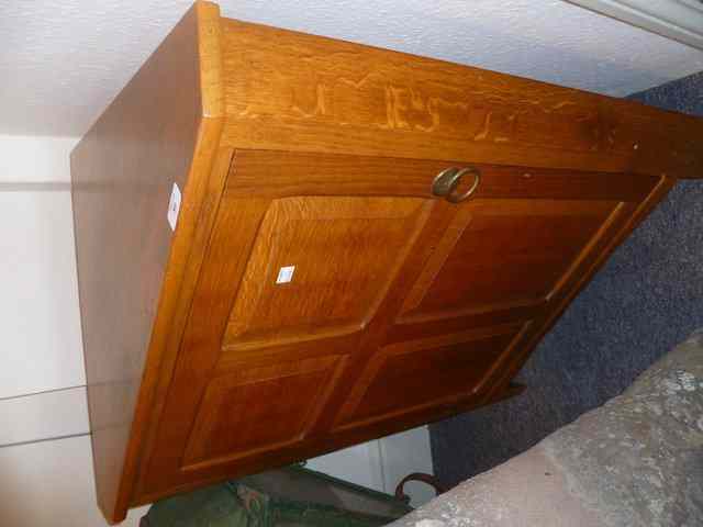 Appraisal: AN OAK CRAFT MADE CORNER CUPBOARD probably made by Reynolds