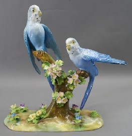 Appraisal: A Crown Staffordshire bone china group of birds set upon