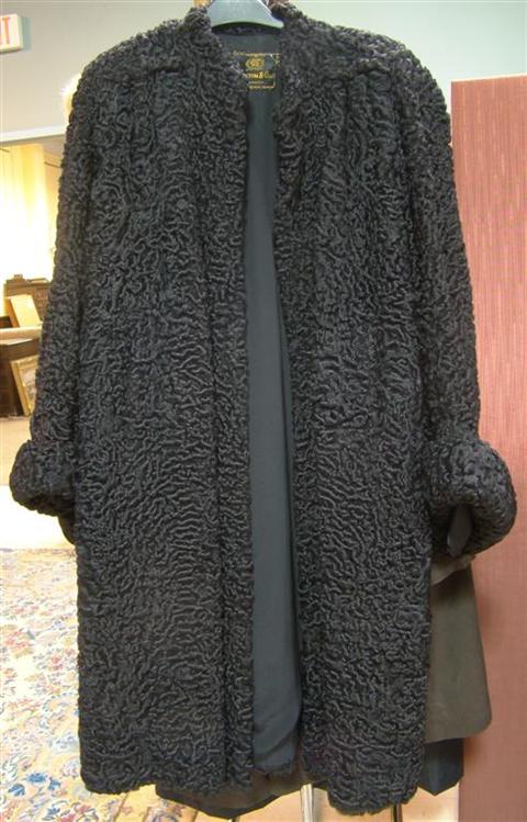 Appraisal: BLACK PERSIAN LAMB COAT WITH CUFFS Woolf Brothers