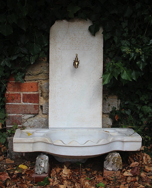 Appraisal: AN OTTOMAN WHITE MARBLE FOUNTAIN with carved shaped basin and