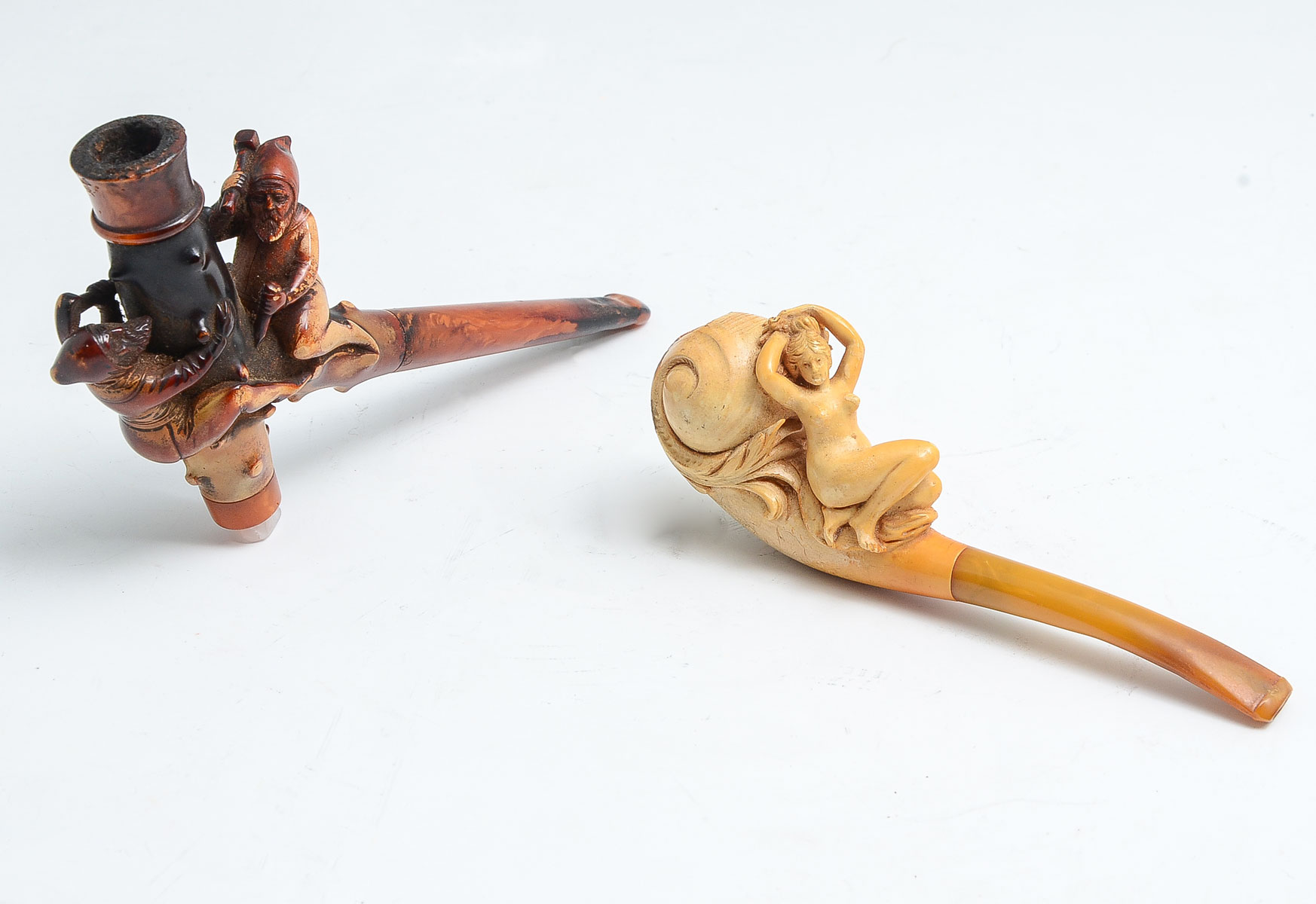 Appraisal: MEERSCHAUM BRIARWOOD PIPE Seated nude lady Meerschaum pipe with amber