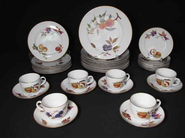 Appraisal: Royal Worcester Evesham pattern dinnerware with gold rims Set consists