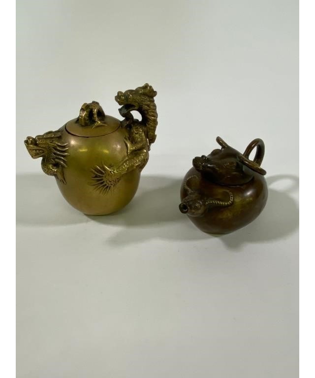 Appraisal: Two Chinese bronze teapots Republic period tallest is a dragon