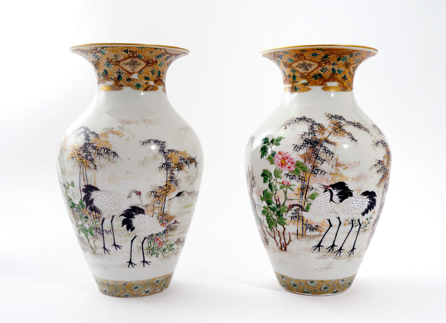 Appraisal: PAIR JAPANESE HAND PAINTED PORCELAIN CRANE VASES One with cranes