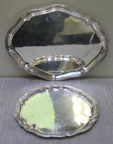 Appraisal: SILVER Two Silver Trays Includes on scalloped edge round tray