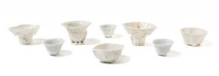 Appraisal: Eight Blanc-de-Chine Porcelain Wine and Libation Cups QING DYNASTY comprising