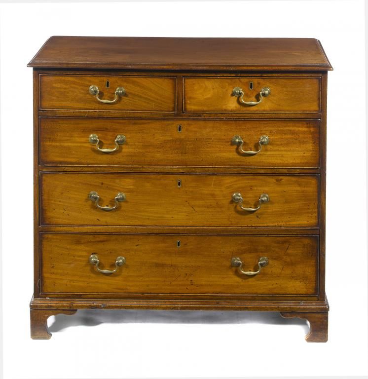 Appraisal: A GEORGE III MAHOGANY CHEST OF DRAWERS fitted two short