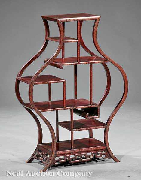 Appraisal: A Chinese Carved and Metal Inlaid Hardwood Display Stand vasiform