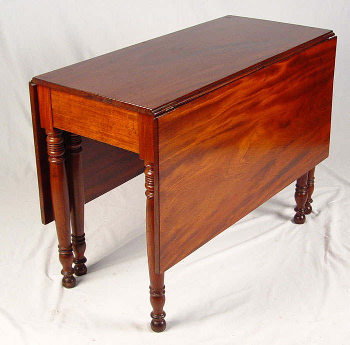 Appraisal: BOARD MAHOGANY DROP LEAF TABLE Fine swing leg table turned