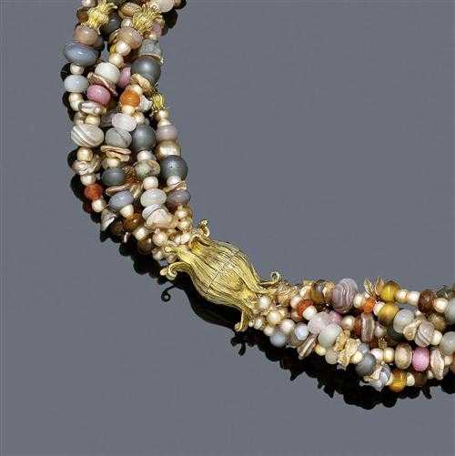 Appraisal: PEARL GEMSTONE AND GOLD NECKLACE TORSADE Yellow gold Decorative necklace