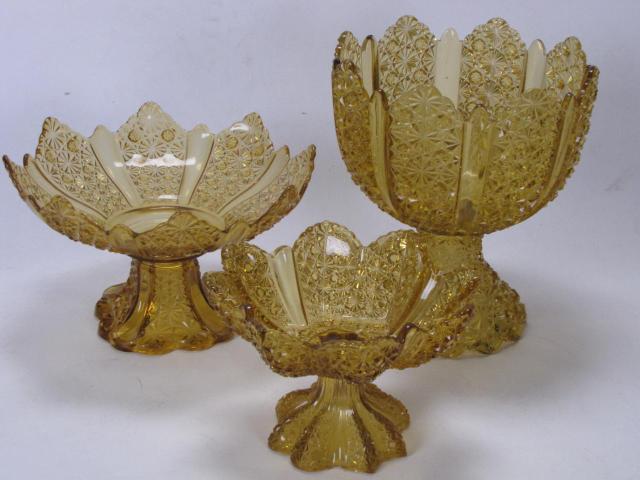 Appraisal: Group of Amber Daisy and Button Glass including three pedestal