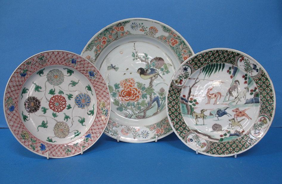 Appraisal: A CHINESE FAMILLE VERTE PLATE decorated with the eight horses