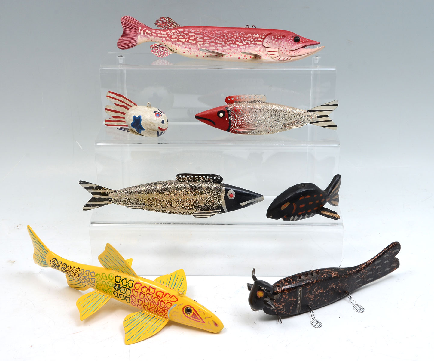 Appraisal: SEVEN HAND-CARVED AND PAINTED FISH DECOYS To Include Hand-Carved Oman