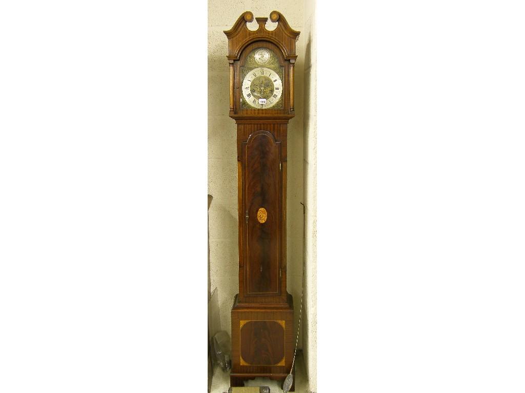 Appraisal: Walnut two train wall clock the square cream dial within