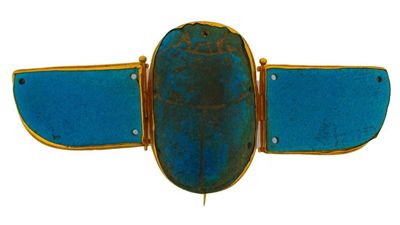 Appraisal: A large blue glazed ceramic scarab brooch Mounted in gold