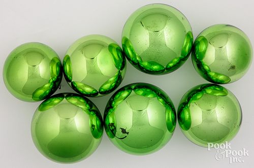 Appraisal: SEVEN GREEN GLASS KUGEL ORNAMENT BALLSSeven green glass Kugel ornament