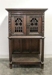 Appraisal: A Gothic Revival Oak Court Cupboard Height x width x