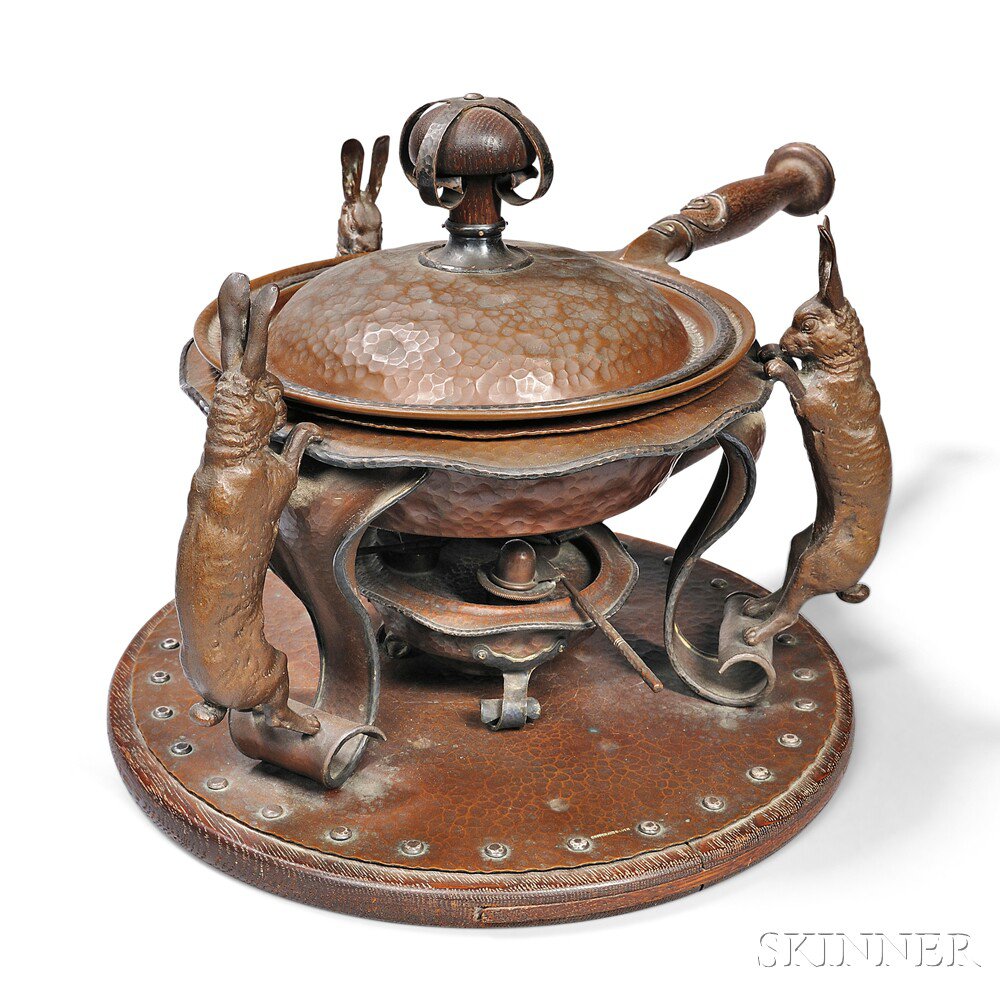 Appraisal: Joseph Heinrich Hare Chafing Dish Copper oak silver United States