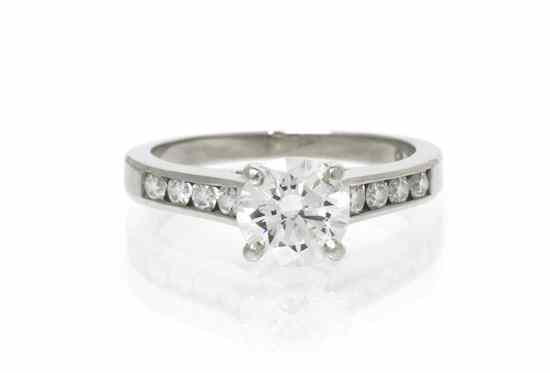 Appraisal: A Platinum and Diamond Ring Jeff Cooper containing one round