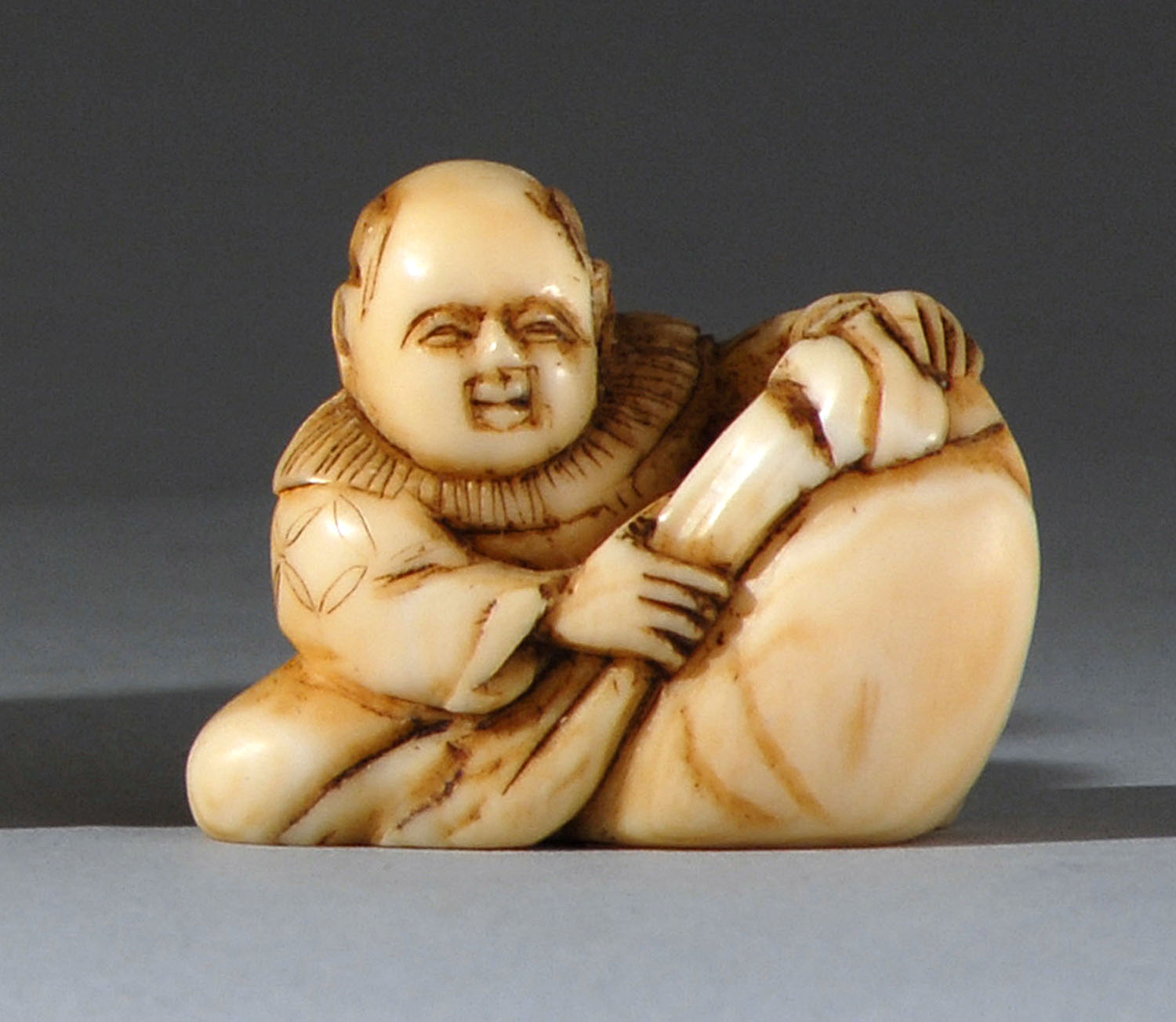 Appraisal: BONE NETSUKE th CenturyIn the form of a karako with