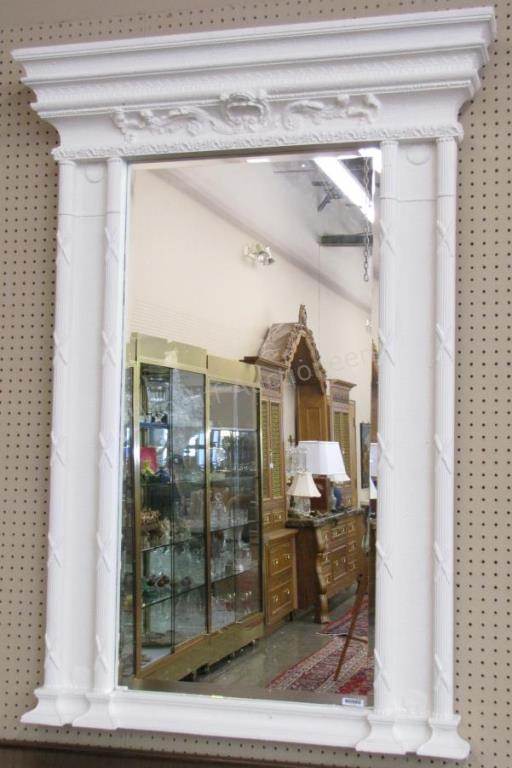 Appraisal: An antique wall mirror French style carved frame painted white