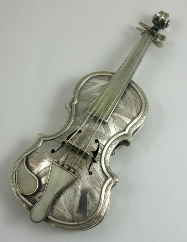 Appraisal: A RUSSIAN HALLMARKED SILVER VIOLIN-FORM WATCH SNUFF CASE hand chased