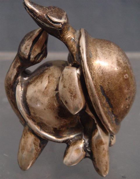 Appraisal: Sterling silver turtle erotica figure separates to reveal the baby