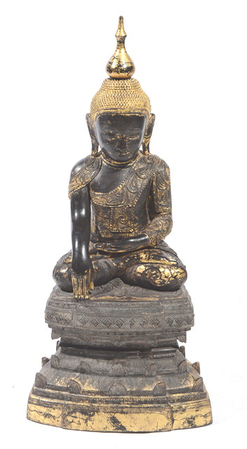 Appraisal: A THAI CARVED WOOD SEATED BUDDHA with lotus flower base