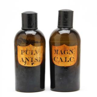 Appraisal: A Pair of Dark Amber Apothecary Bottles French circa s