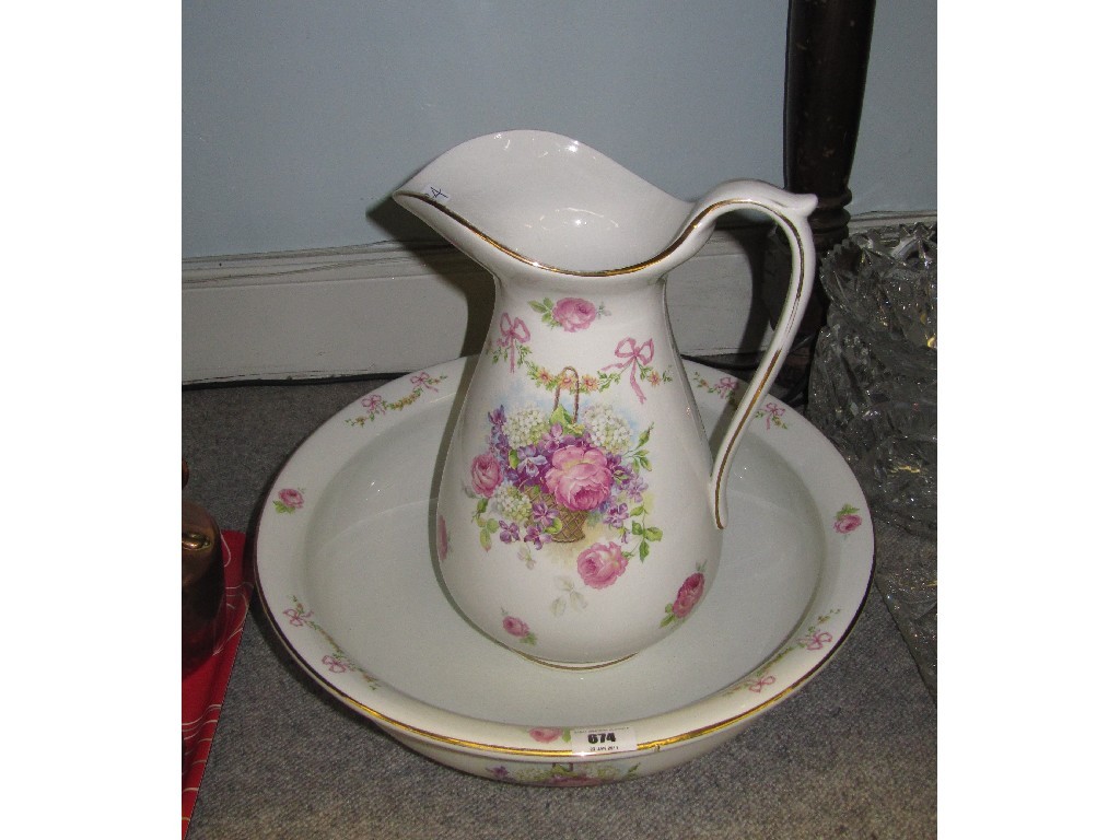 Appraisal: A florally decorated basin and ewer