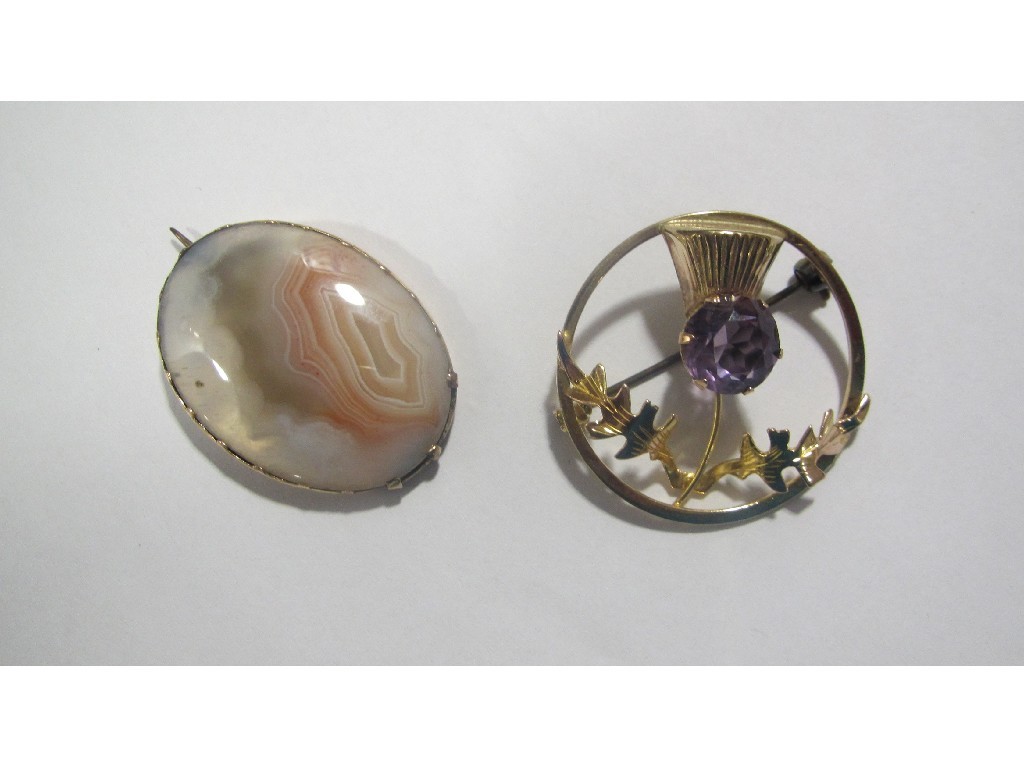 Appraisal: Lot comprising a gold mounted oval agate brooch and a