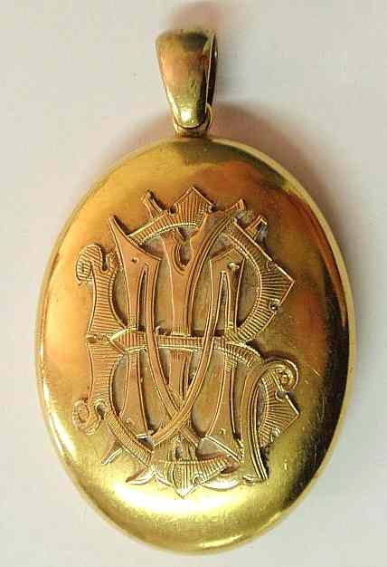 Appraisal: Ladies k yellow gold locket pendant with applied initials BLM